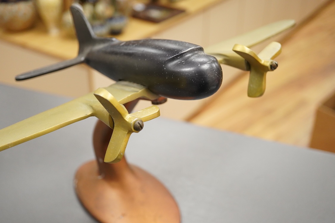 An Art Deco style mixed metal model of a WW2 plane- 24.5cm long x 24cm high